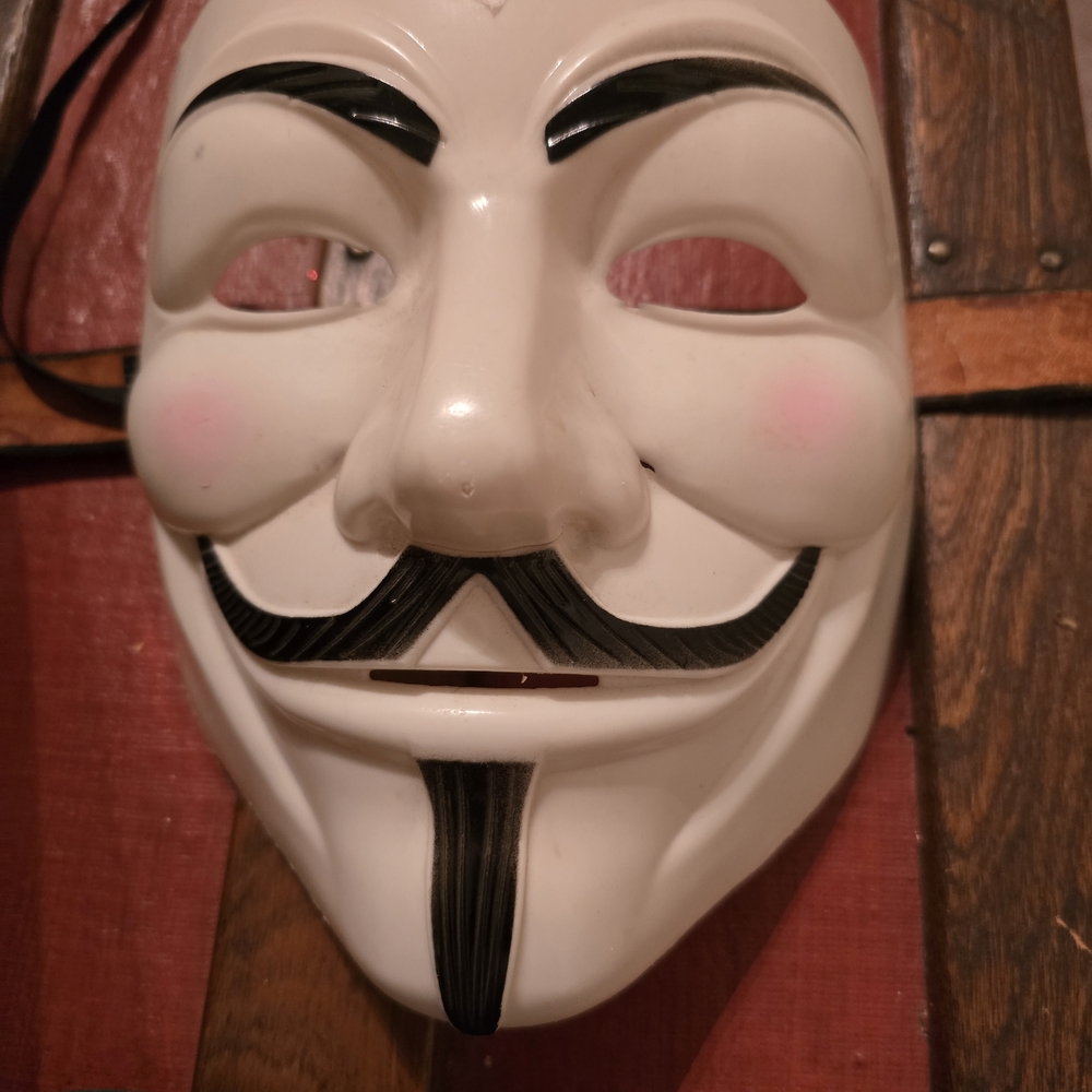 White and Black Guy Fawkes Or Vendetta Mask Or Magician Or Mr Robot Halloween?